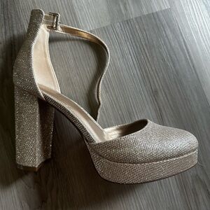 Ankis Black Platform Closed Toe Heels, 4 in